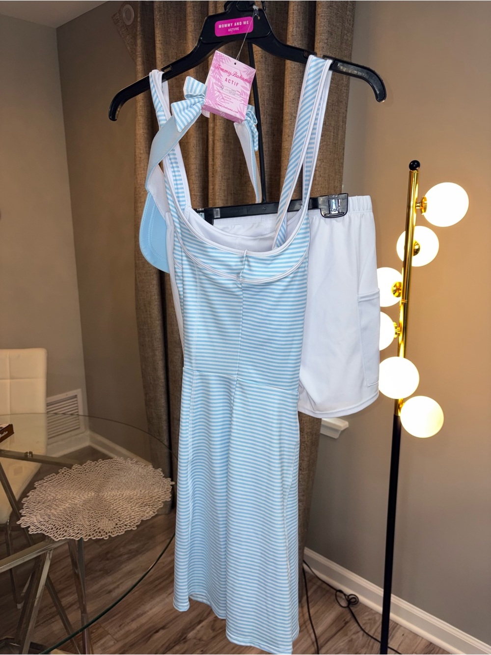 Tommy Bahama Light Blue & White Striped Dress with White Shorts and a Hat
